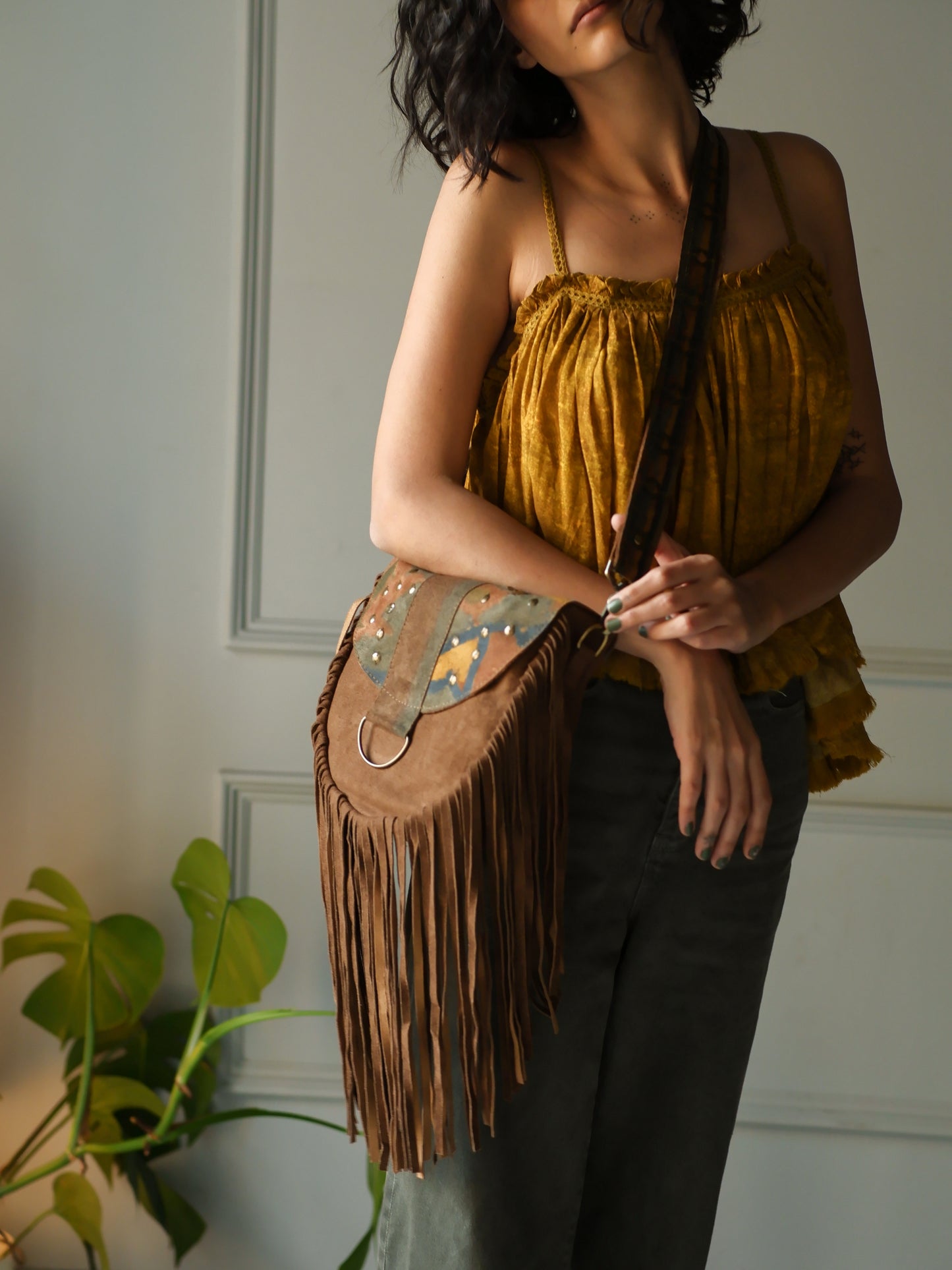 Brown printed sequin saddle bag with fringes